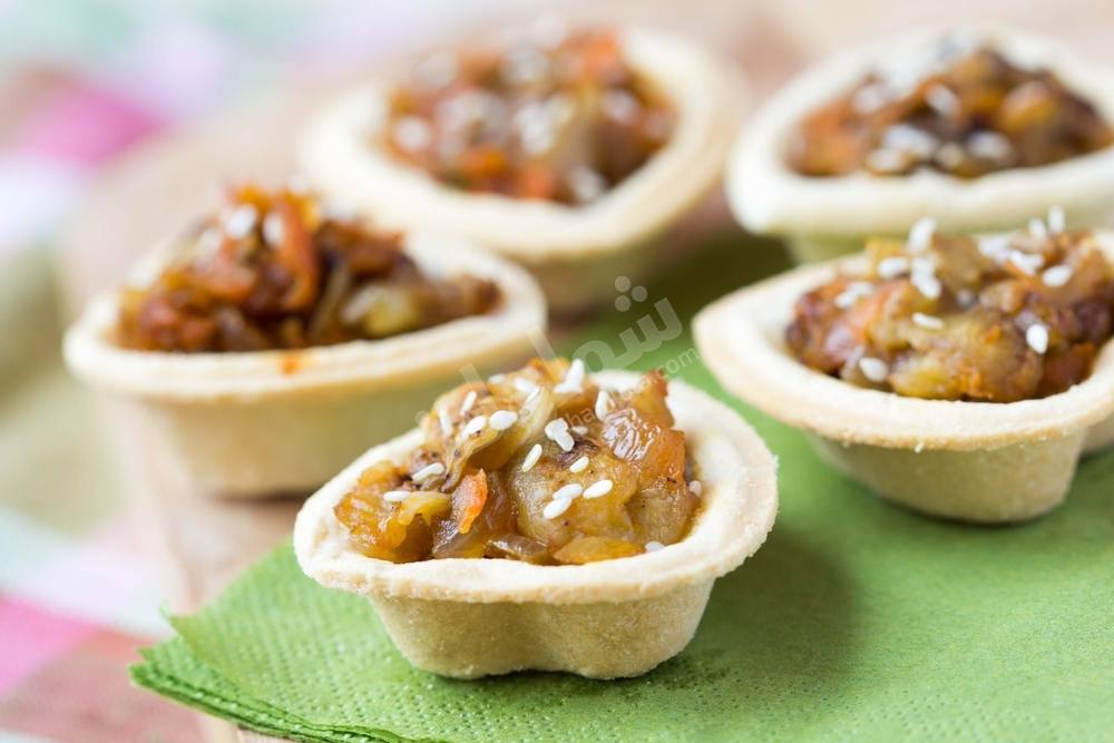 طريقة عمل تارت الباذنجان https://food.ouklat.com/wp-content/uploads/2021/04/522f44e068dc044bb55f75b96c6843a33280a7d8-2.jpg