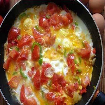 طريقه عمل الشكشوكة بالطماطم https://food.ouklat.com/wp-content/uploads/2021/10/cf86ada0ae31d391cd0d686ea97288a159e004da-3.jpg
